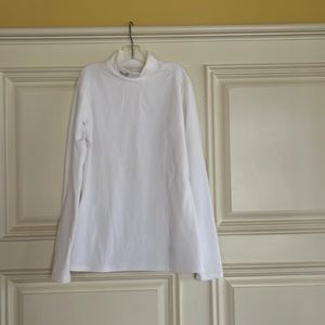 Kids Under Armour mock turtleneck sport top. Perfect for early spring sports.